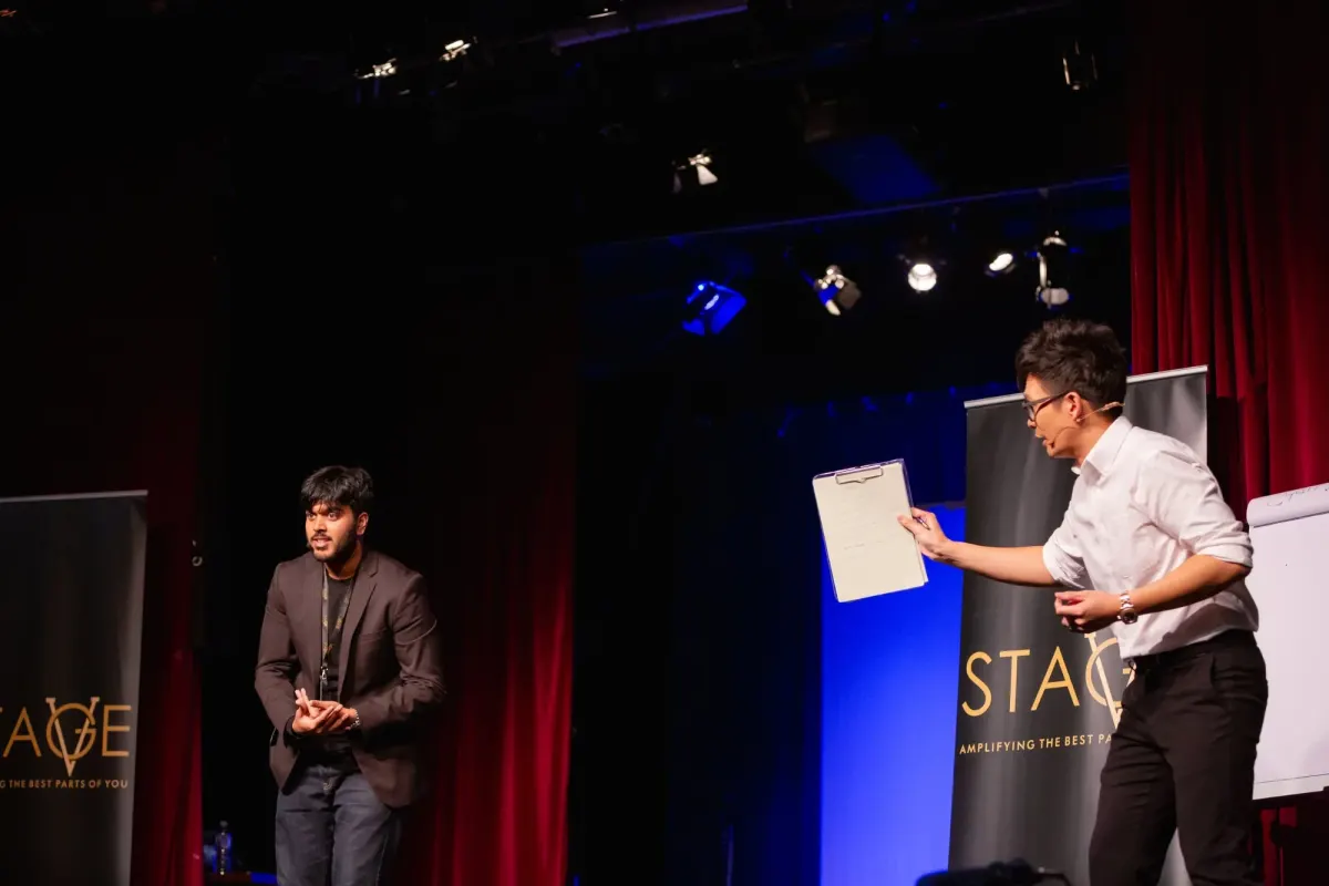 Tanzeer on stage with another presenter